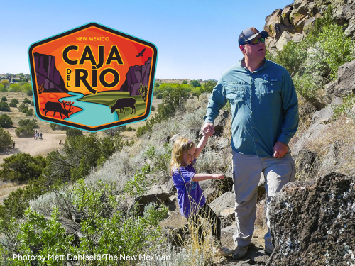 Pastor Andrew and daughter Brooke on Caja del Rio, with Caja del Rio logo