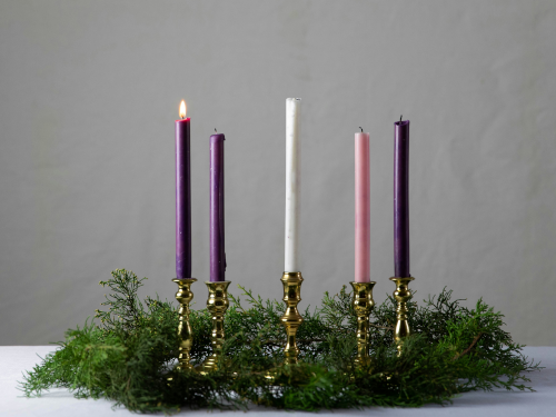 Four Advent candles with first candle lit