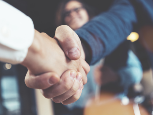 Closeup of people shaking hands