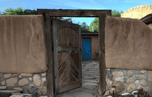Gate to a courtyard in adobe style
