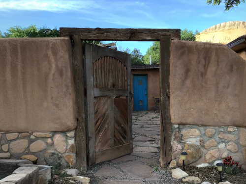 Gate to a courtyard in adobe style