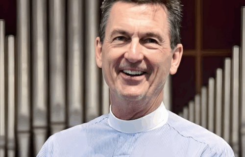 Portrait photo of the Rev Dr John Lentz