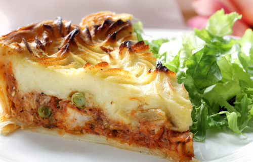 Shepherd's pie slice with salad