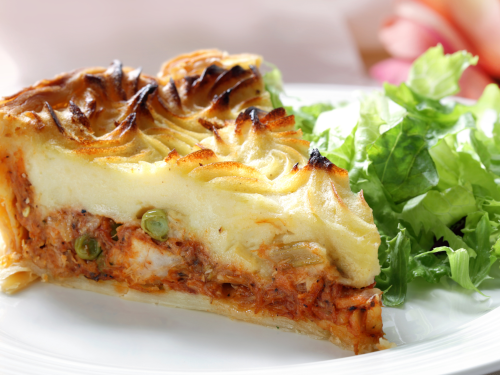 Shepherd's pie slice with salad