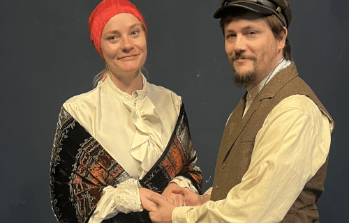 two characters dressed in clothes from A Fiddler on the Roof