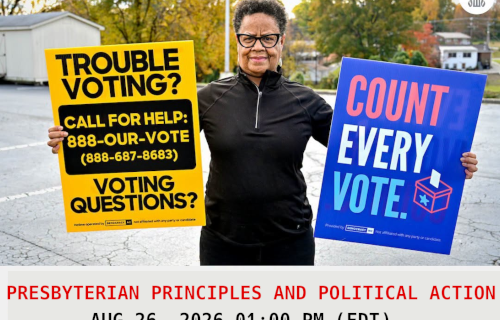 person holding two signs: "Trouble voting? call for help 888-OUR-VOTE (888-687-8683) Voting questions?" & "Count Every Vote"