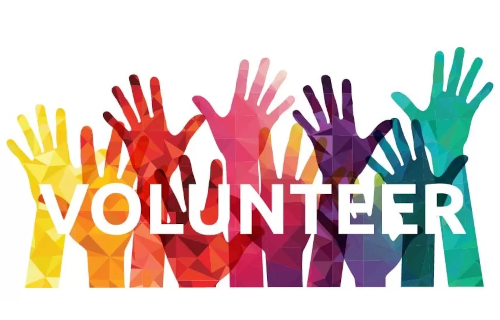 Rainbow hand silhouettes with the word volunteer in white